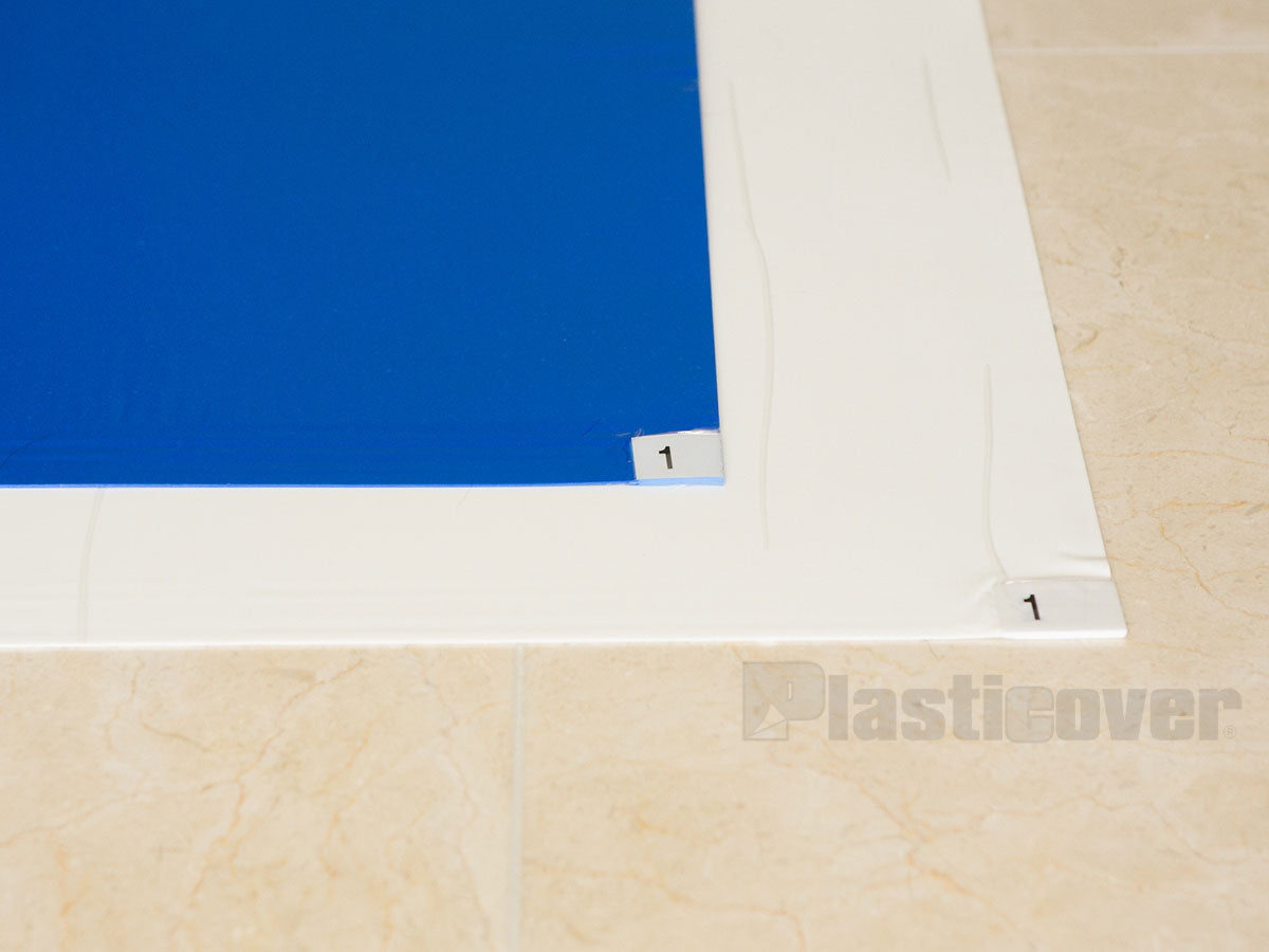 Blue vs. White Sticky Mats on Floor