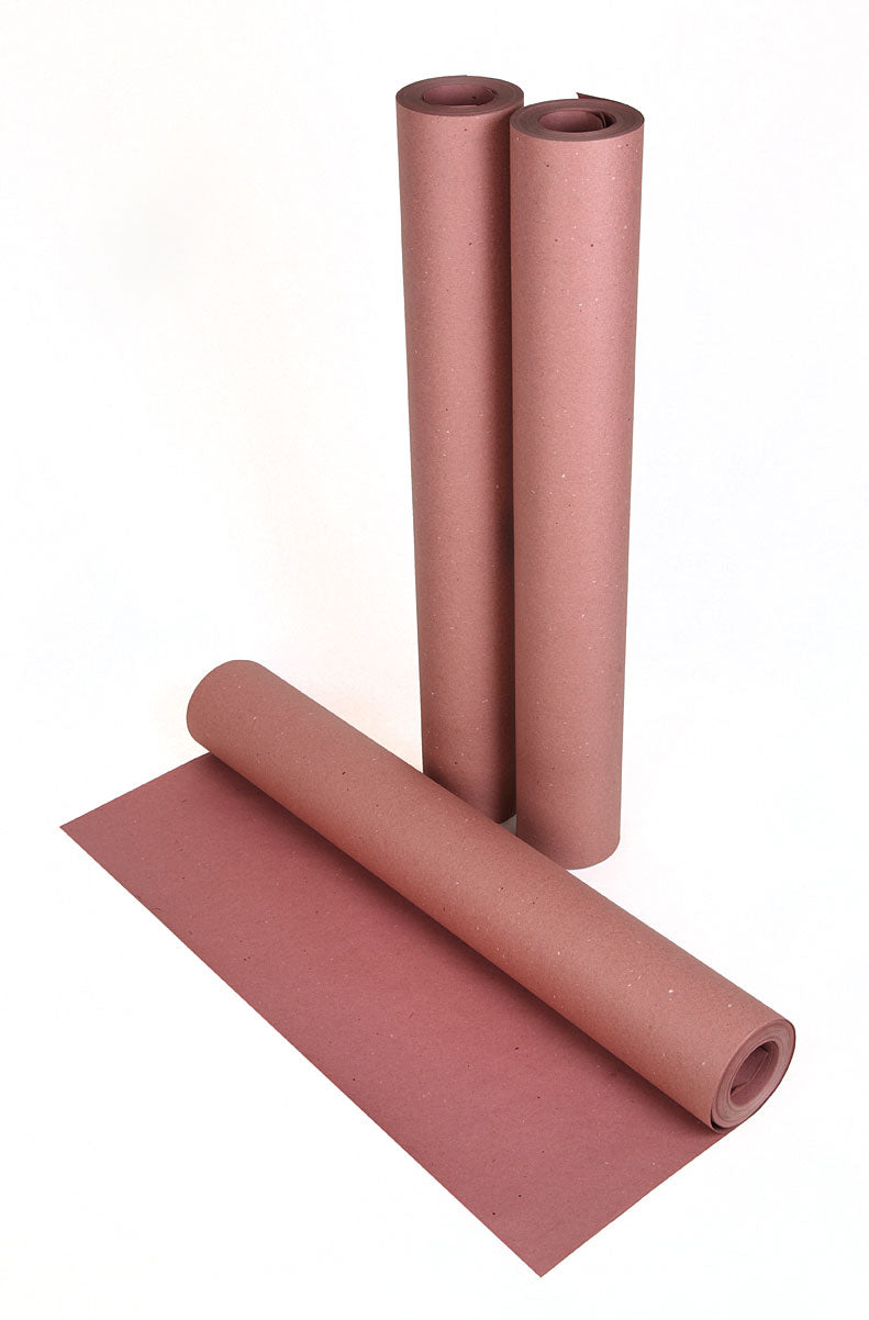 Rolling Out Red Rosin Paper Rolls