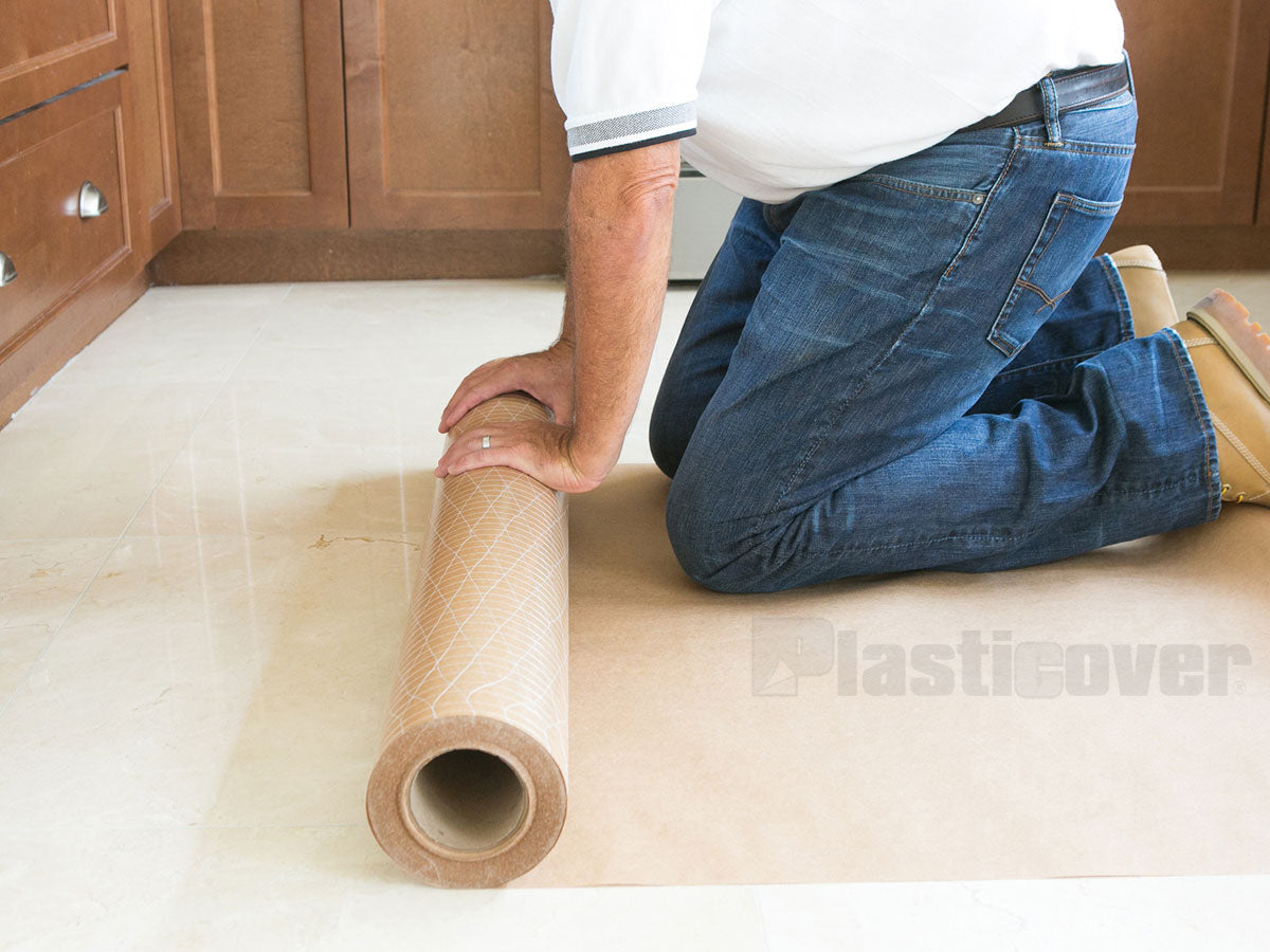 Contractor Installing Reinforced Kraft Paper for Floor Protection