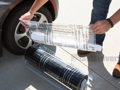 Detailer Installing Film Using Towel Trick