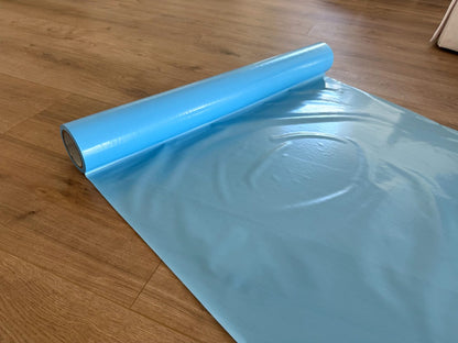 6 mil Fire Retardant Film Rolling out on Hardwood